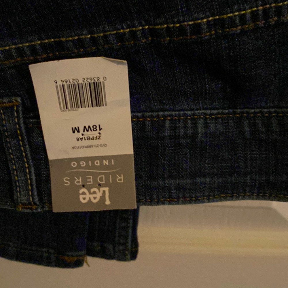 NWT Lee. Indigo riders with inside elastic attached to waist to stay up